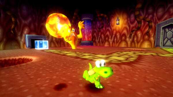 Da Croc 2 Kingdom of the Gobbos, Croc in una caverna mentre un mostro di fuoco lancia una grande palla infuocata