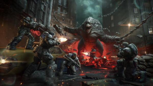 Key art ufficiale di Gears of War: E-Day con Marcus Fenix, Dom Santiago e la Squadra Bravo che affrontano i Locust nelle strade di Kalona.
