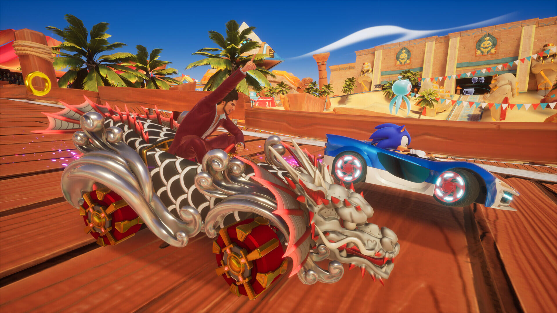 Screenshot in-game di una gara sul tracciato desertico con Ichiban Kasuga e Sonic in Sonic Racing: CrossWorlds