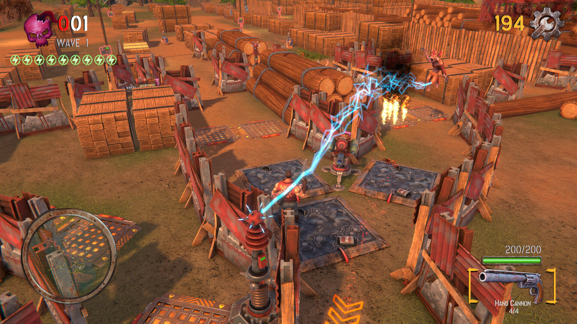 Screenshot di gioco di Survive 'Til Dawn ambientato in una segheria con torri a scarica elettrica, trappole di catrame e bocche di fuoco attive.